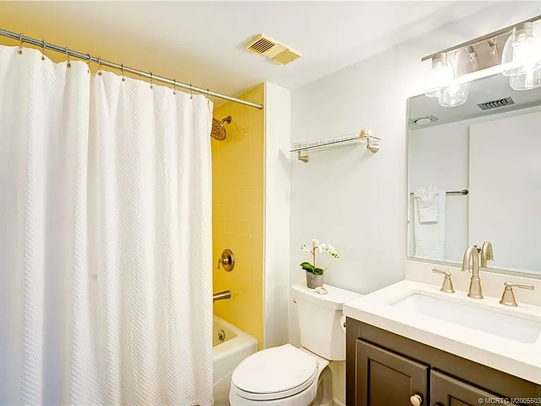 5553 NE Gulfstream Way — Photo 15