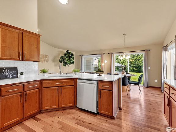 fully equipped kitchen with cooking utensils, pots, pans, plates, silverware, etc.