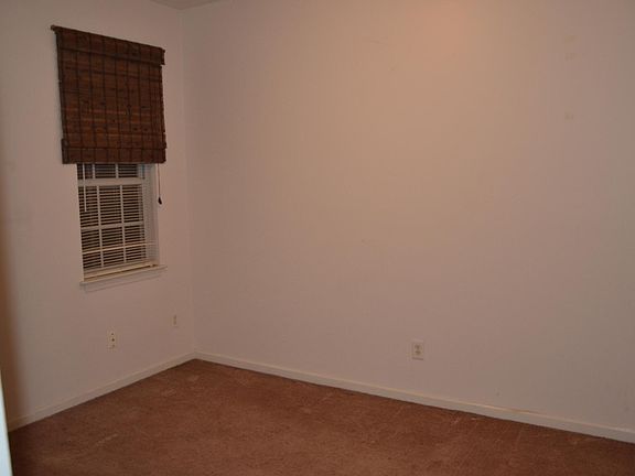 Bedroom flooring has been updated to laminate