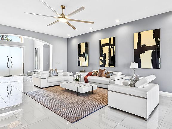 GREAT ROOM HAS POOL VIEW