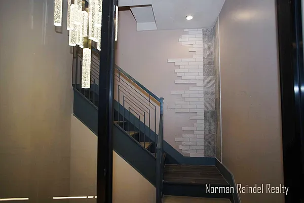 Rented by Norman Raindel, LREB | media 57