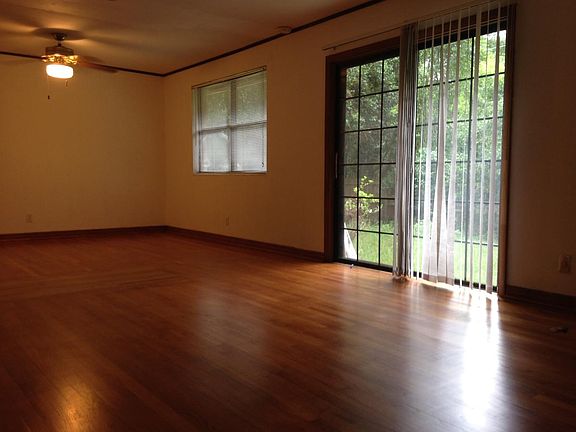 Large living room with sliding doors to back yard.