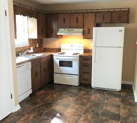 3rd image of 681 Village Green Dr NW