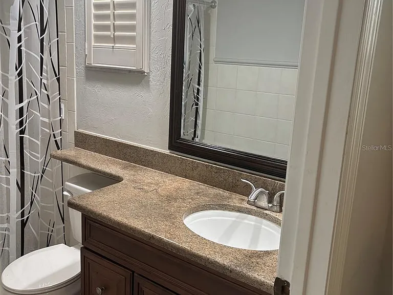 105 E Cottesmore Cir — Photo 16