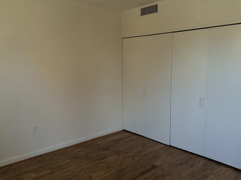 Large bedroom closet (doors have been upgraded since photo.)