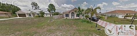 This is a panoramic view of directly across the street from the lot. You can see the nice upgraded h
