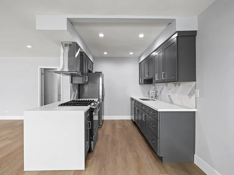 Full-Size Kitchen with Energy-Effcient Appliances and Ample Cabinet Storage