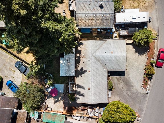 Birds eye view of the home. Additional parking (or RV parking) available to the right of the home.