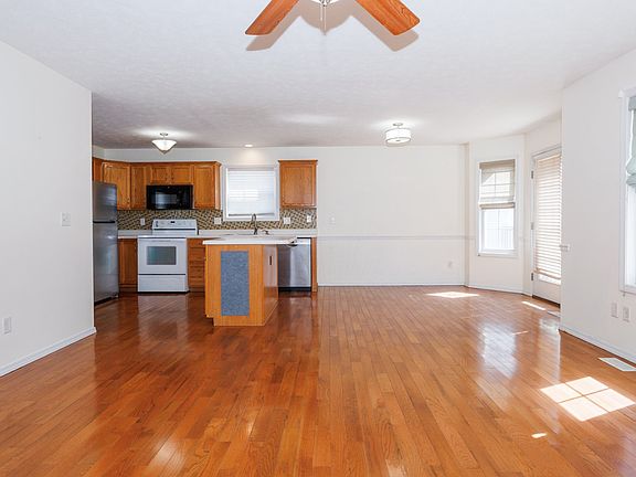 Family room view to eat-in kitchen
