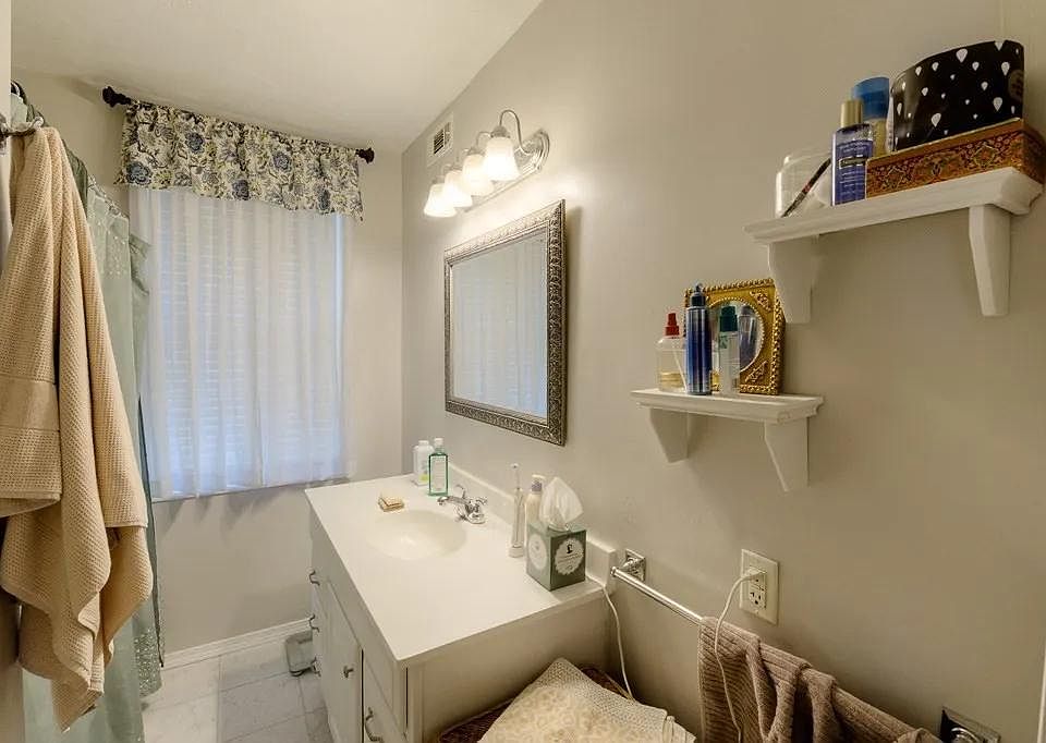 Updated bathroom with bath tub
