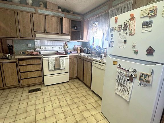 5th image of 11368 E 34th Pl