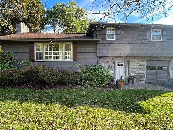 Cedar window shutters and complete gutter system.