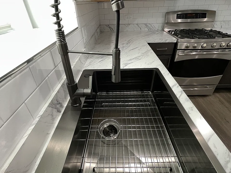 30 in sink with a top of a line faucet