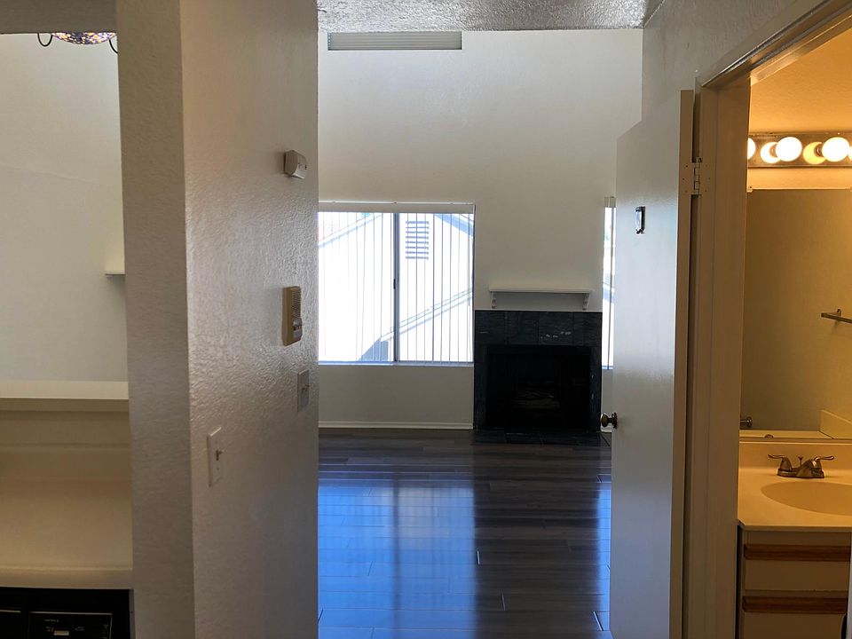 Second floor living room, kitchen and half-bathroom