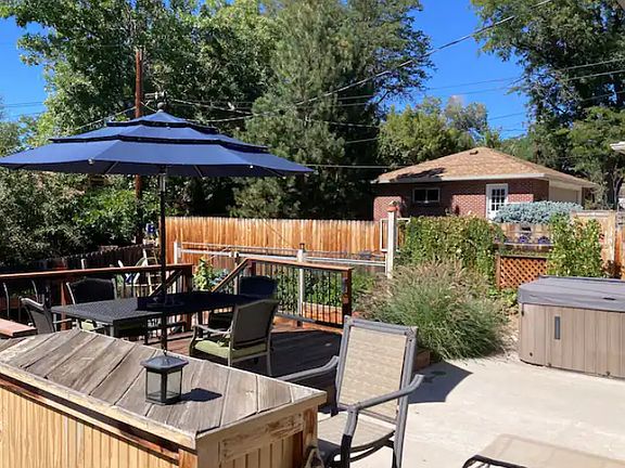 Home is located in a quiet neighborhood close to Olde Town Arvada. Fully-fenced yard with hot tub out back.