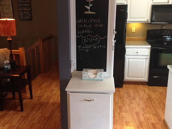 chalkboard wall by kitchen