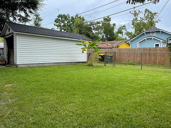 Fenced in backyard and garage
