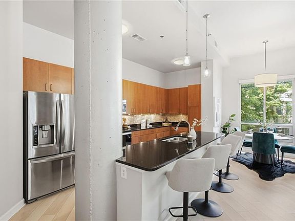 4th image of 711 Cosmopolitan Dr #107