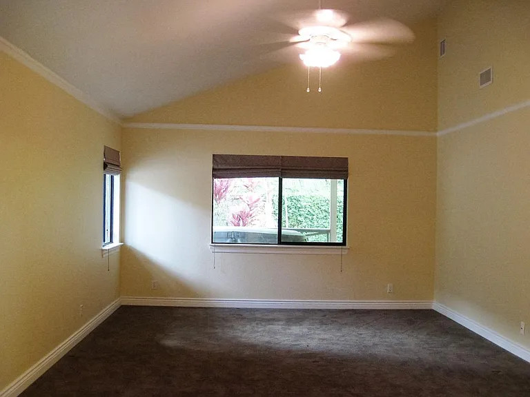 Vaulted ceiling, huge master bedroom with double sink in bat