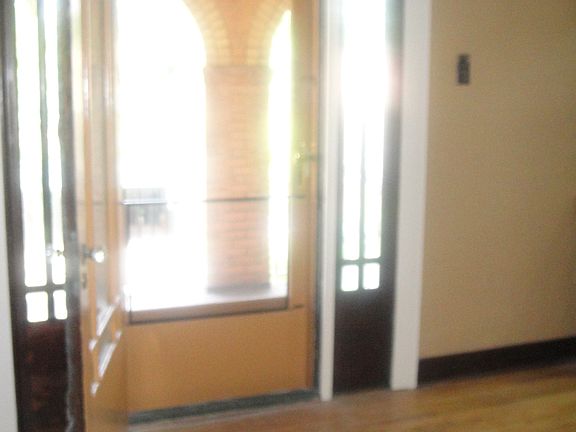 living room entry to above ground porch