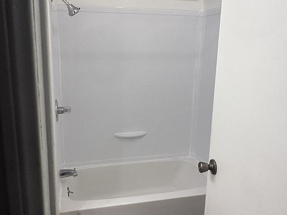 New Shower surround and tub.