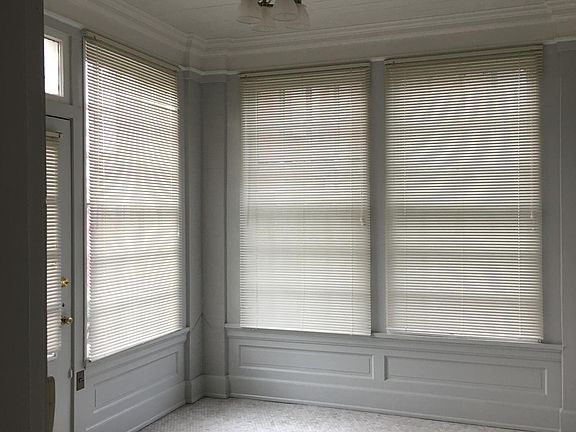 Dining room. Many tenants say 'I live in this room'. Large windows with interior storms for comfort and energy efficiency.