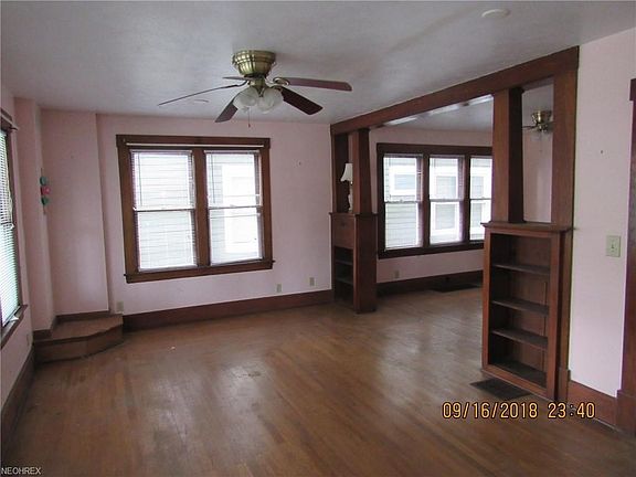 Hardwood floors and trim add character and warmth. This is the living room on the first floor.