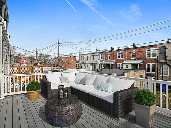 Second story rear deck off the kitchen