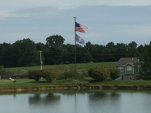 Flagpole across the pond