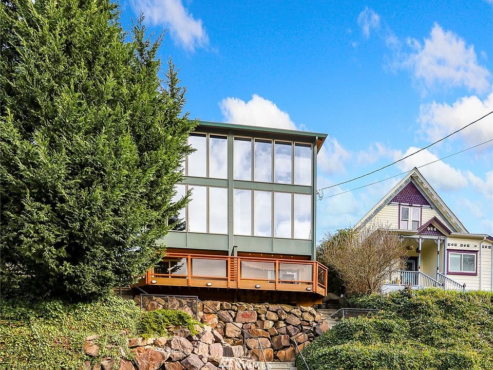 Wall to wall windows at the front of the home.