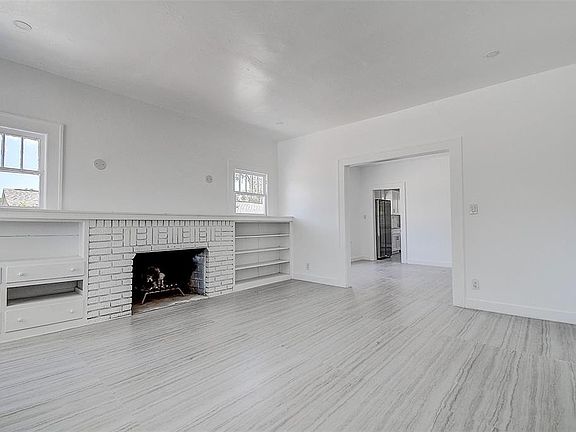 nside, fresh finishes and tile flooring flow through bright living spaces, anchored by a cozy fireplace _ ideal for relaxing evenings.