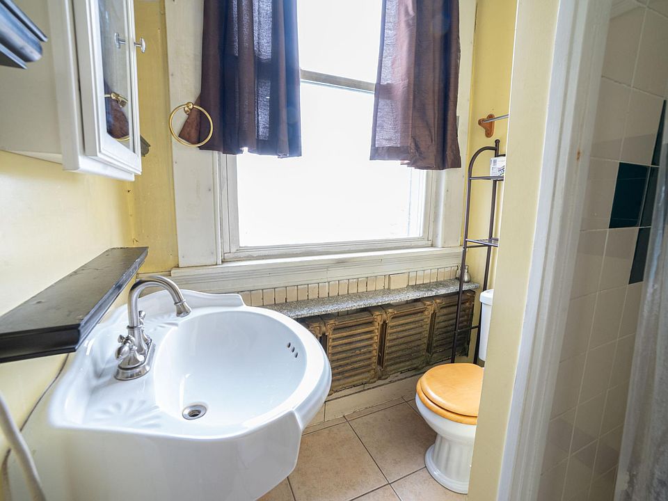 St. Louis apartment has a toilet and bathtub in the kitchen