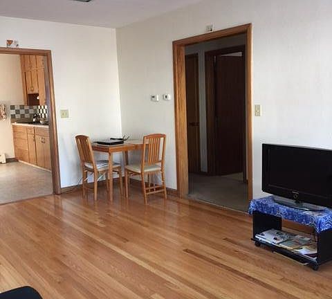 Entry to kitchen and bedrooms (layout is reversed)