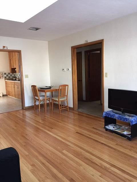 Entry to kitchen and bedrooms (layout is reversed)