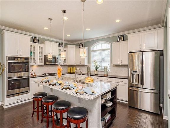 This photo is a model home photo or artist rendering due to construction stage.