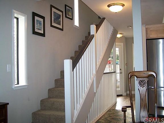 Entry, and stairs up to Master Bedroom and guest bedroom.