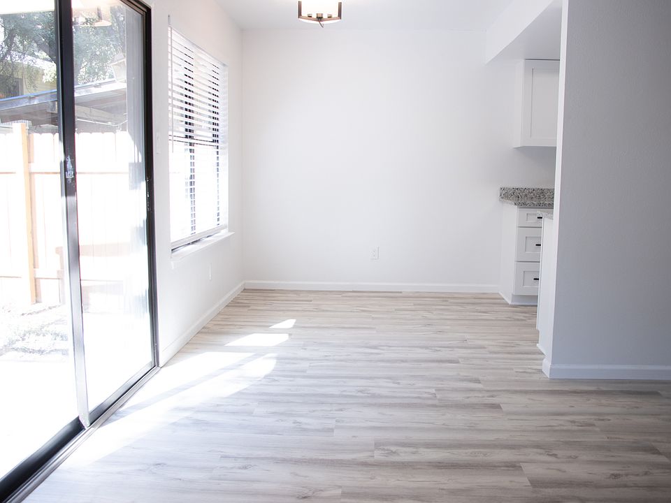 Living room facing dining area.