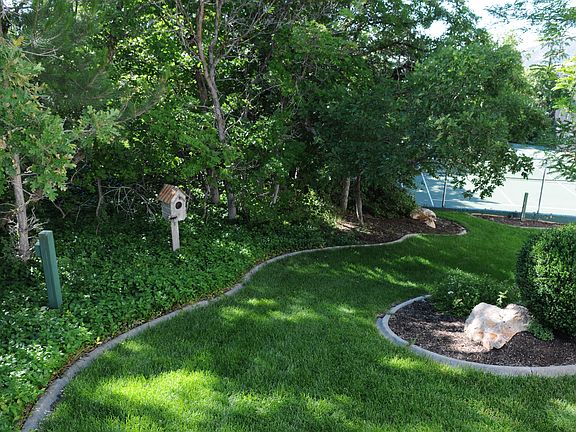 Front Yard and Tennis Court