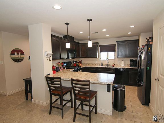 5th image of 10231 E 34th St