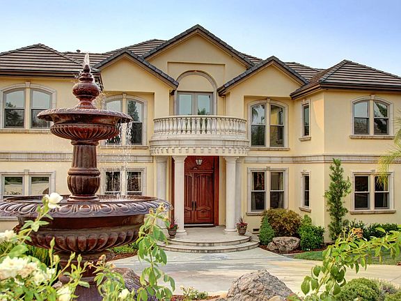 Fountain in front of mansion