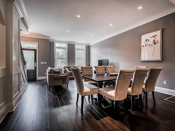Open floor plan on main level with abundant natural light, 1