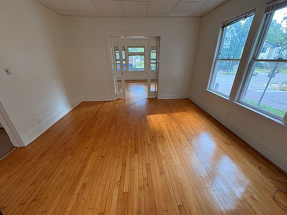 Living room and den w/ pocket doors