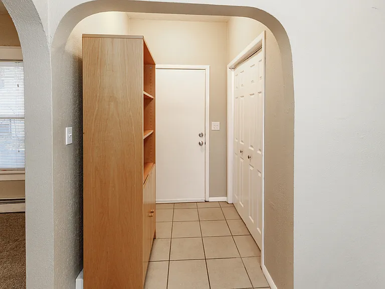 Door off Kitchen to small wood deck
