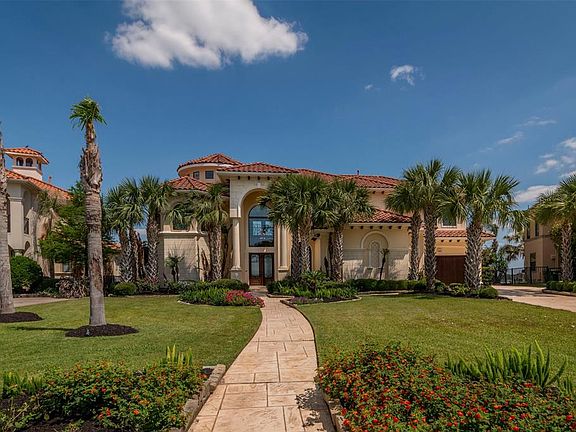 Stunning landscaping that offers a rich and welcoming feel as you walk to the front double doors! Another nice detail: electrical outlets in exterior soffits are perfect for Christmas lights during that season if you choose to put them up.