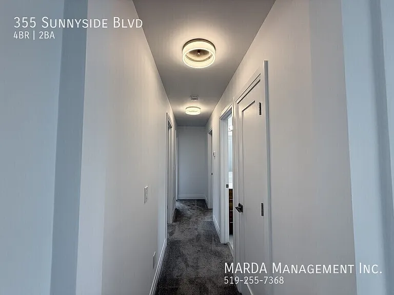 355 Sunnyside Blvd — Photo 23