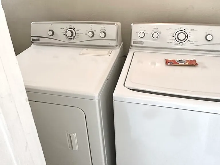 WASHER AND DRYER IN LAUNDRY ROOM OF THIS UNIT