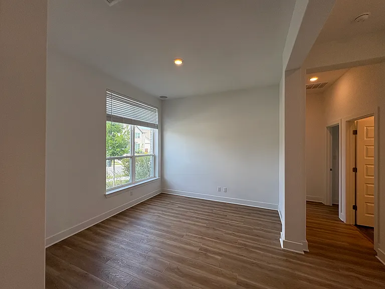 Entry leads right to a flex space. Great for an open concept office or playroom.