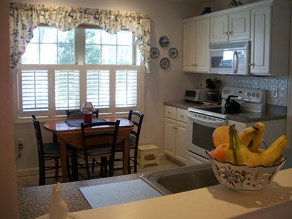 Eat in kitchen with tile floor