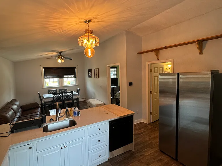 Kitchen and living room continued.