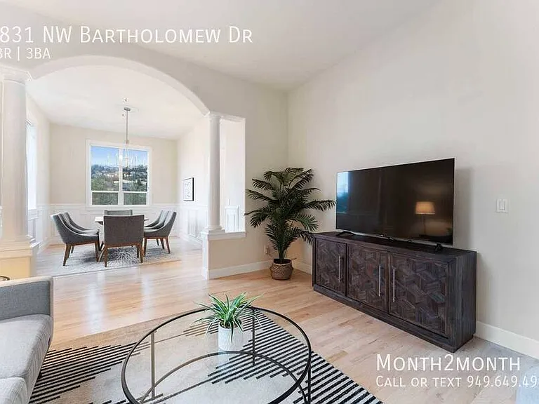 9831 NW Bartholomew Dr — Photo 4